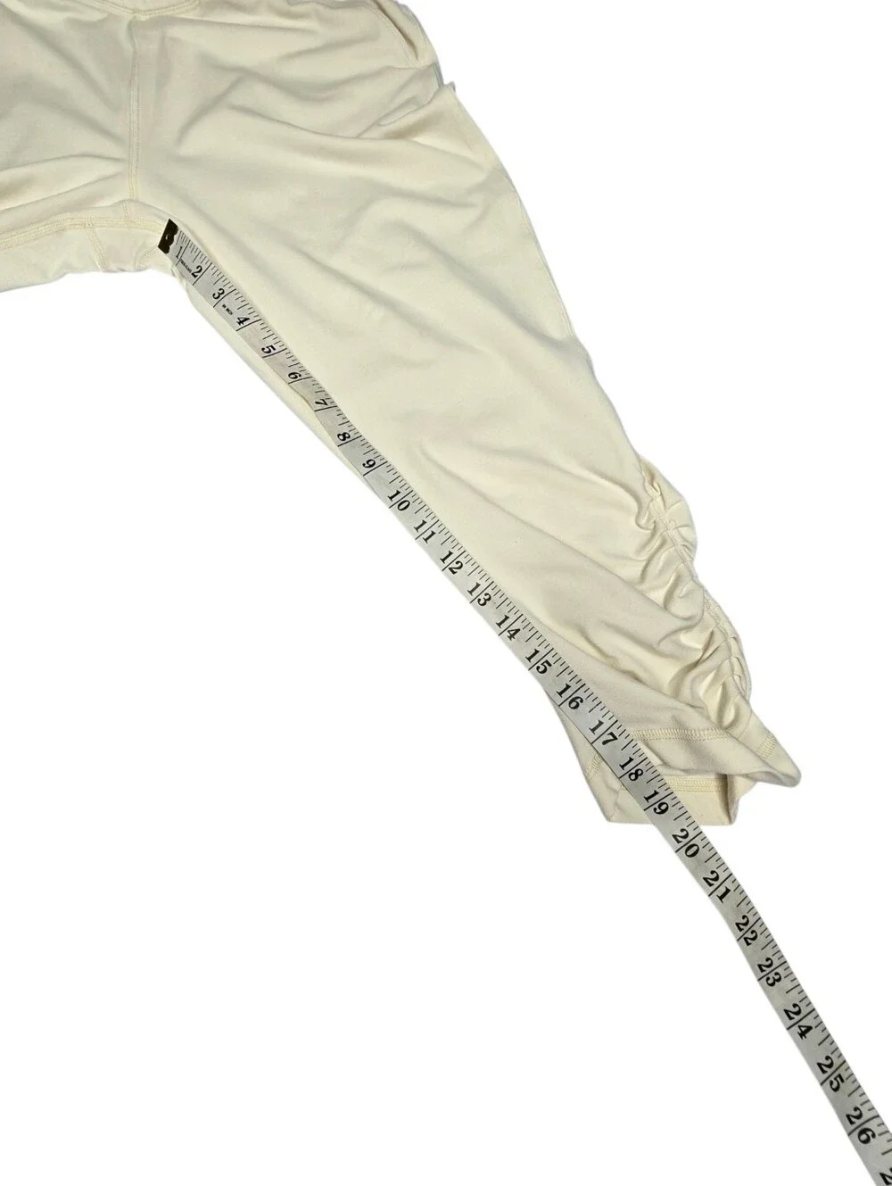 lululemon Athletica Sunset Salutation Crop leggings in a light beige or cream